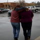 A student from Great Mills (Md.) High School is comforted by her guardian while being picked up at Leonardtown (Md.) High School following a school shooting at nearby Great Mills High on March 20, 2018.